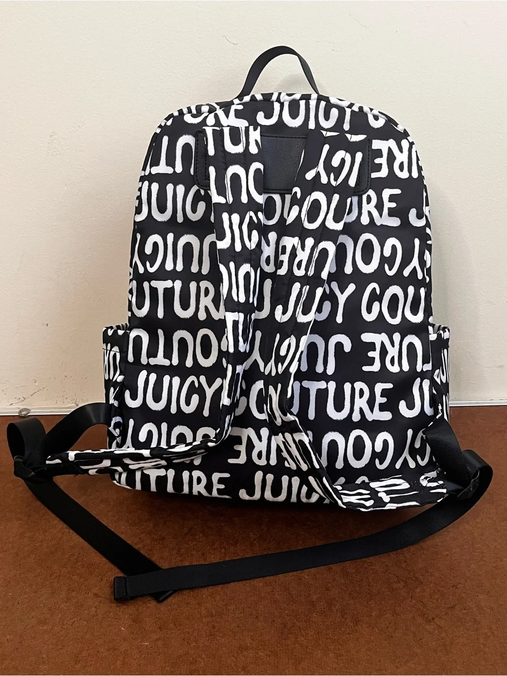 Juicy Couture 15”l 13”w